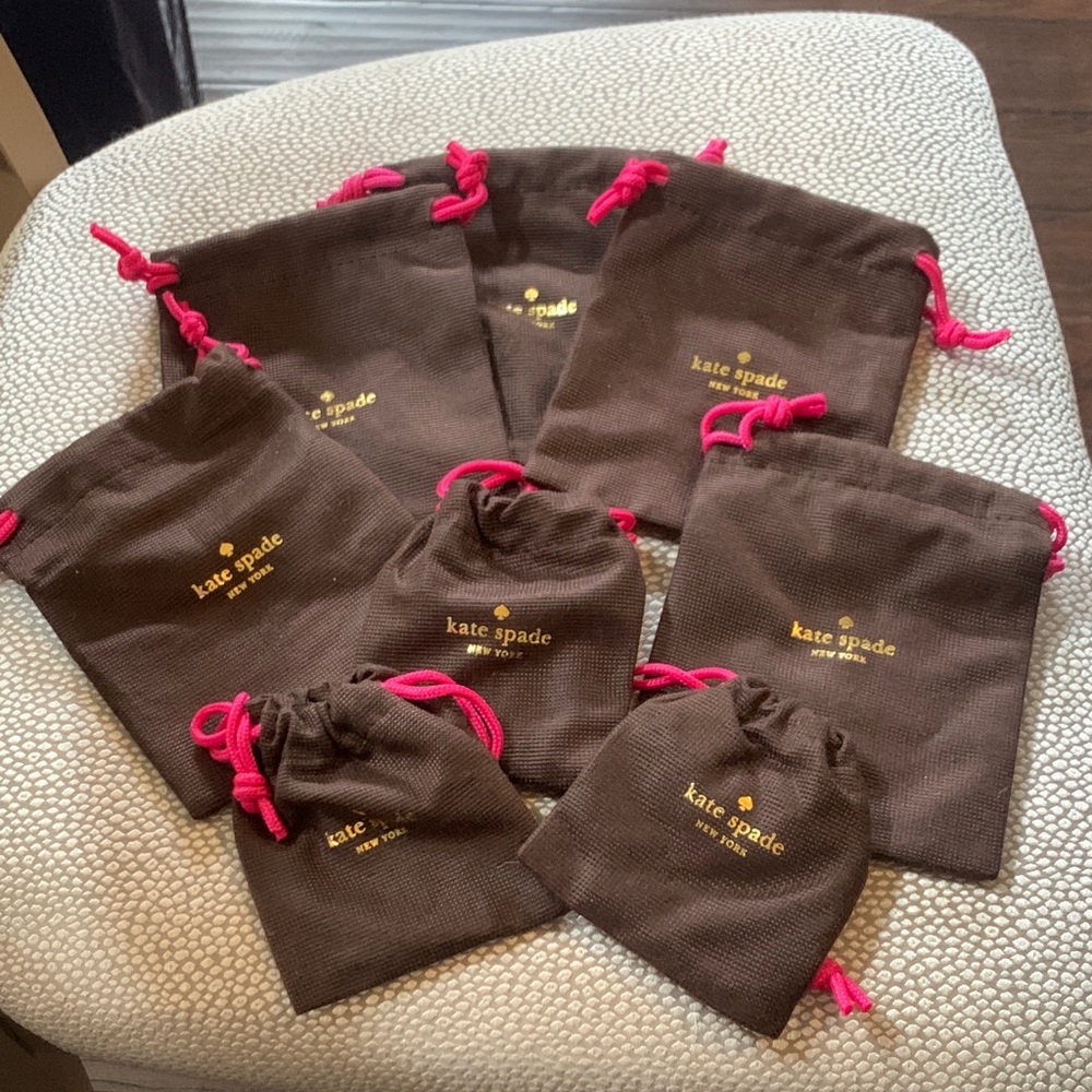 kate spade brown jewelry pouches with pink drawstrings (set) 5 large 3 small